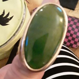 gold plated ring with green stone